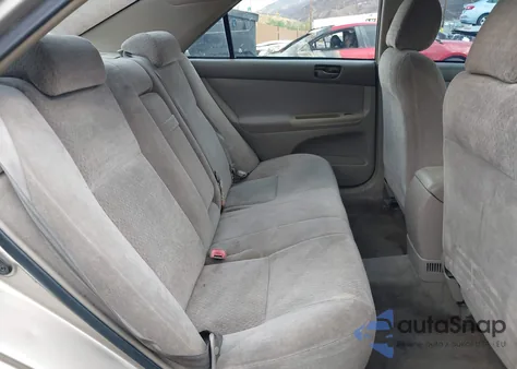 2002 Toyota Camry Le from USA, damaged, VIN 4T1BE32K22U512361